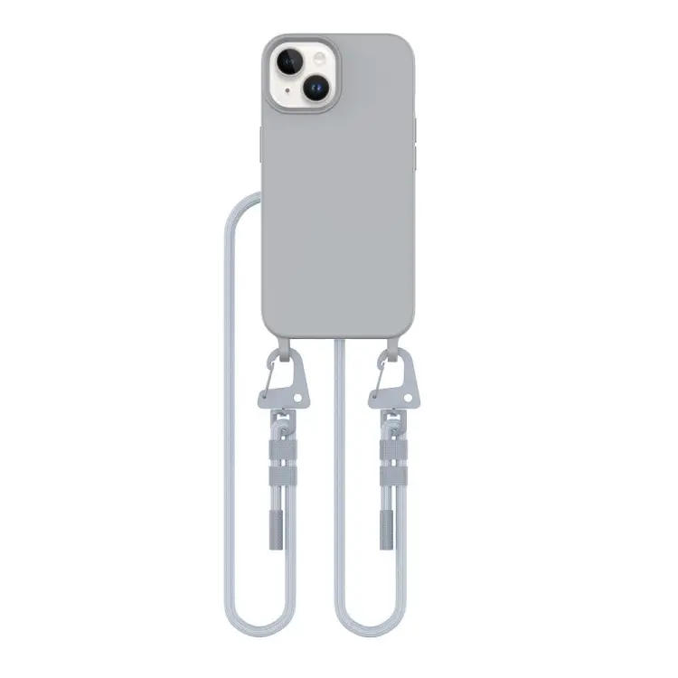 Szare etui z białym sznurkiem crossbody. Wbudowany pierścień magnetyczny MagSafe idealny do mocowania akcesoriów. Wygodny sznurek pozwala na noszenie telefonu iPhone 15, chroniąc go przed upadkami.